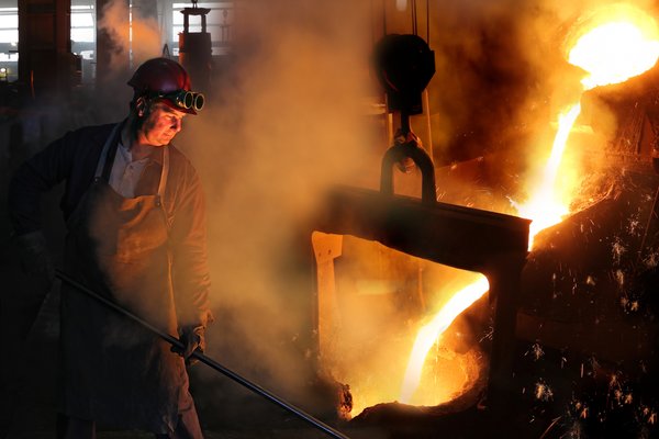 A steel worker in a foundry.