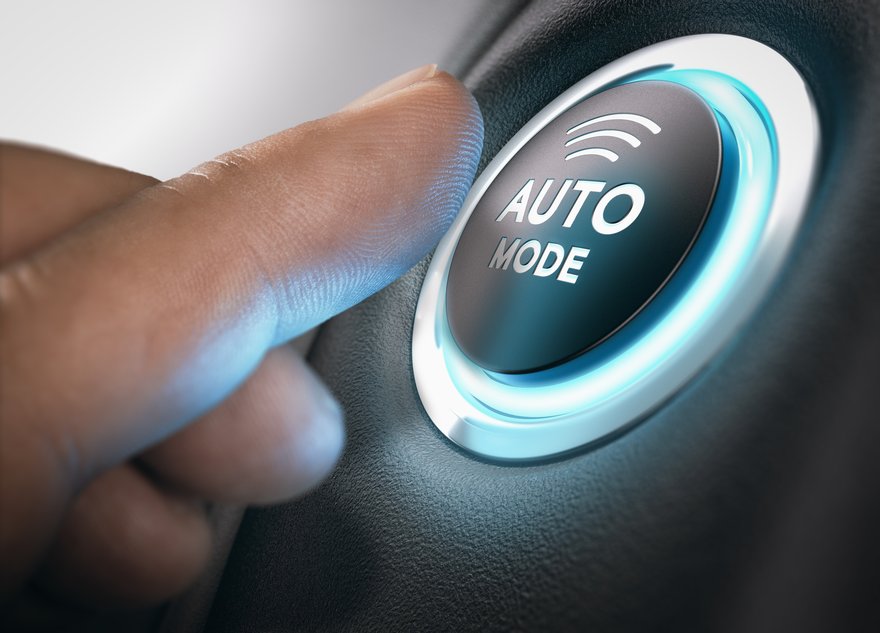 Finger pushing auto button.