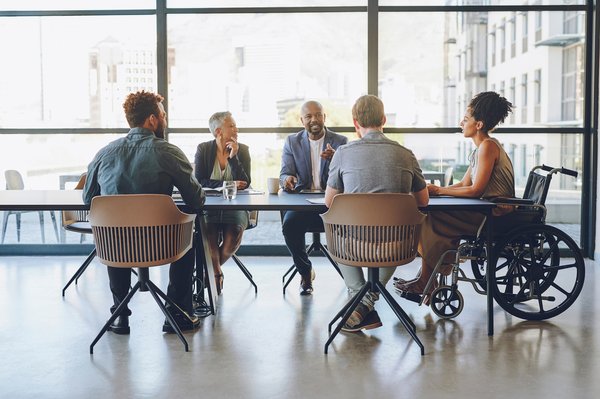 Group of people around a conference table