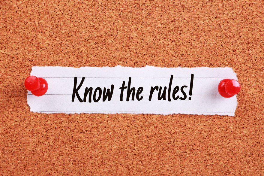 Paper tacked on corkboard reads "Know the rules!"