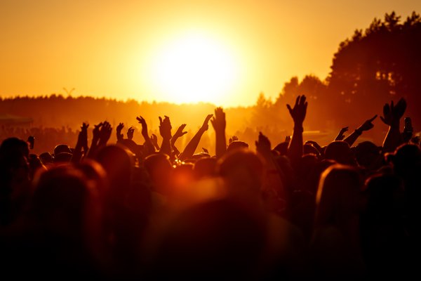 Crowd at a concert at sundown
